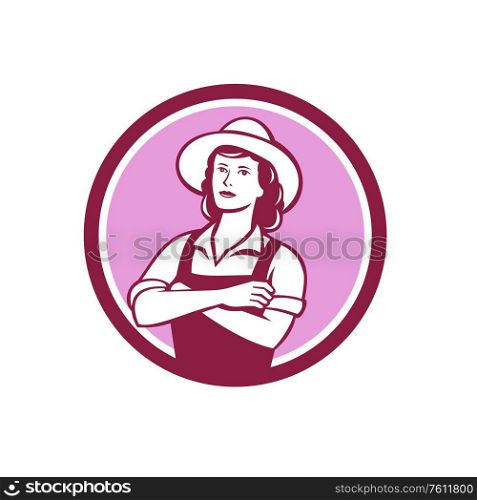 Illustration of a female organic farmer with arms folded with hat and overalls facing front set inside circle on isolated background done in retro style.. Female Organic Farmer Circle Retro