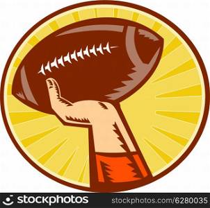 Illustration of a hand catching ,throwing American Football ball done in retro woodcut style set inside circle with sunburst in background.&#xA;