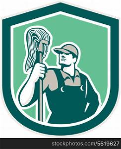 Illustration of a janitor cleaner worker holding mop standing viewed from front set inside shield crest on isolated background done in retro style. . Janitor Cleaner Holding Mop Shield Retro