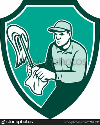Illustration of a janitor cleaner worker standing holding mop and cleaning cloth wipes set inside shield crest on isolated background done in retro style. . Janitor Cleaner Holding Mop Cloth Shield Retro