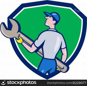Illustration of a mechanic carrying giant spanner looking up to the side viewed from rear set inside shield crest on isolated background done in cartoon style. . Mechanic Carrying Giant Spanner Crest Cartoon