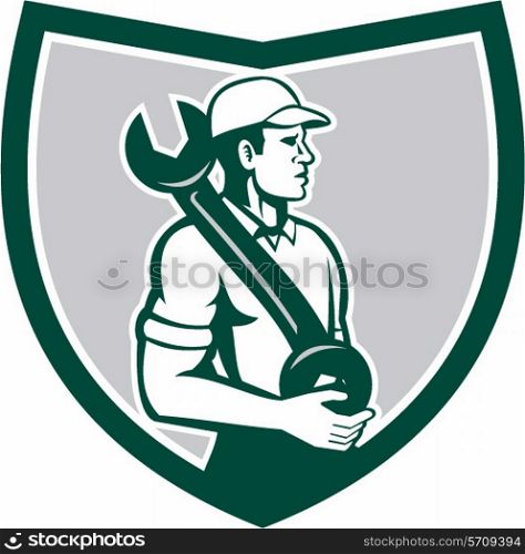 Illustration of a mechanic wearing hat holding spanner wrench on shoulder looking to the side set inside shield crest on isolated background done in retro style.. Mechanic Spanner Wrench Shoulder Shield Retro