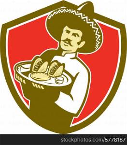 Illustration of a Mexican chef cook wearing hat sombrero serving plate with tacos on isolated background set inside shield crest done in retro style. . Mexican Chef Cook Serving Taco Plate Shield