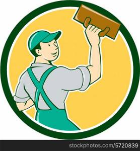 Illustration of a plasterer masonry tradesman construction worker standing with trowel looking to the side viewed from rear set inside circle on isolated background done in cartoon style. . Plasterer Masonry Trowel Circle Cartoon