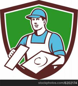 Illustration of a plasterer masonry tradesman construction worker wearing hat holding trowel viewed from front set inside shield crest done in retro style on isolated background. . Plasterer Masonry Trowel Crest Retro