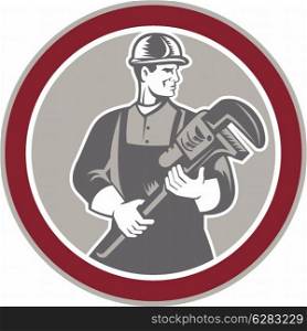 Illustration of a plumber holding a giant monkey wrench set inside circle facing front done in retro woodcut style on isolated background.. Plumber Holding Giant Wrench Woodcut Circle