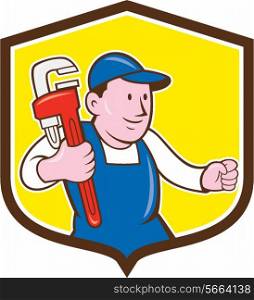 Illustration of a plumber in overalls and hat holding monkey wrench set inside shield crest on isolated background done in cartoon style.. Plumber Holding Monkey Wrench Shield Cartoon