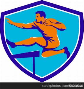 Illustration of a track and field athlete running jumping the hurdles viewed from side set inside shield crest done in retro style.. Track And Field Athlete Jumping Hurdle