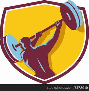 Illustration of a weightlifter lifting swinging barbell with both hands looking to the side viewed from rear set inside shield crest on isolated background done in retro style.. Weightlifter Swinging Barbell Rear Crest Retro