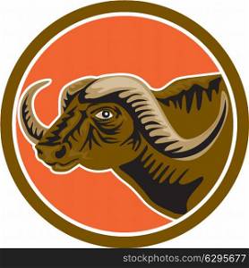 Illustration of an african buffalo head viewed from the side set inside circle on isolated background done in retro style.