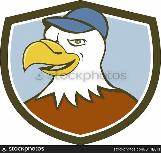 Illustration of an american bald eagle head wearing hat smiling looking to the side set inside shield crest on isolated background done in cartoon style.. American Bald Eagle Head Smiling Shield Cartoon