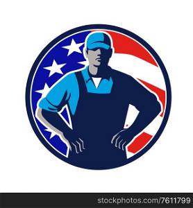 Illustration of an American organic farmer wearing hat and overalls with hands on hips akimbo and USA stars and stripes flag set in circle on isolated background done in retro style. . American Organic Farmer USA Flag Mascot