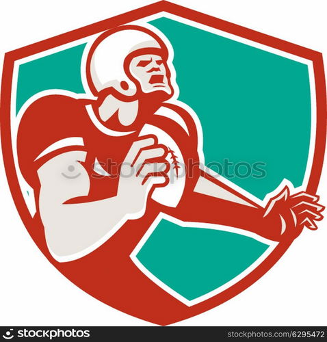 Illustration of an angry american football player holding ball looking up set inside shield crest on isolated background done in retro style. . American Football Player Angry Shield Retro