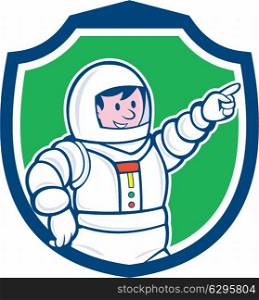 Illustration of an astronaut pointing facing front set inside shield crest on isolated background done in cartoon style