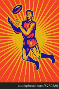 illustration of an aussie rules player jumping catching ball done in retro woodcut style.. aussie rules player jumping catching ball