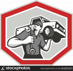 Illustration of an automotive mechanic carrying pick-up truck car vehicle on shoulder holding spanner wrench set inside shield crest shape done in retro style.. Automotive Mechanic Carrying Pick-Up Truck