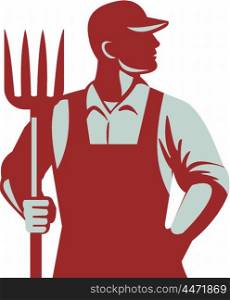 Illustration of organic farmer holding pitchfork looking to the side with one hand in pocket viewed from front set on isolated white background done in retro style.