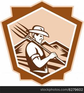 Illustration of organic farmer with pitchfork facing front set inside shield done in retro woodcut style. Organic Farmer Farm Pitchfork Shield