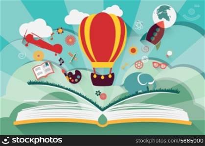 Imagination concept - open book with air balloon, rocket and airplane flying out