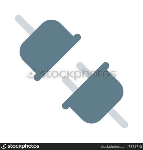 Inserting plug into the socket securely.