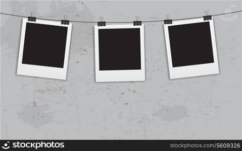 Instant photos with clips in grunge background vector illustration