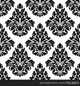 Intricate black and white arabesque design with a large repeat foliate motif in a busy seamless pattern suitable for damask style fabric and wallpaper design. Intricate black and white arabesque design