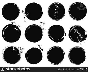 isolated black grunge circle splashes on white background
