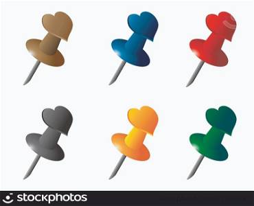 isolated different colors of heart shape pin on white background