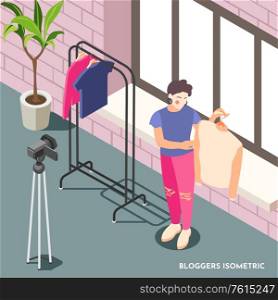 Isometric background with female fashion blogger holding sweater and shooting video with camera 3d vector illustration