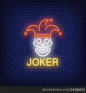 Joker neon sign. Lettering with smiling skull in joker cap. Night bright advertisement. Vector illustration in neon style for gambling, casino and poker club