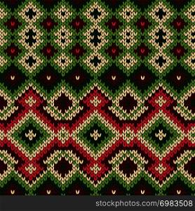 Knitted geometric decorative pattern in red, green and white hues, seamless vector as a fabric texture