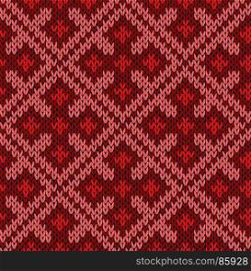 Knitted ornamental seamless vector pattern as a fabric texture in red and pink colors