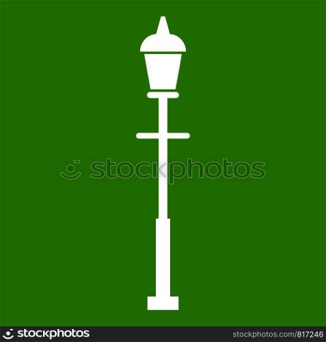 Lantern icon white isolated on green background. Vector illustration. Lantern icon green