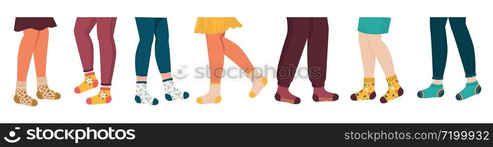 Legs in socks. Hand drawn male and female foot with funny doodle colored socks, trendy apparel set. Vector illustration fashion collection trendy children clothes. Legs in socks. Hand drawn male and female foot with funny doodle colored socks, trendy apparel set. Vector fashion collection