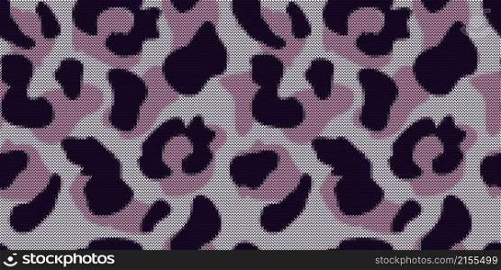 Leopard in knitted style seamless pattern. Jacquard cheetah fur background. Abstract animal skin wallpaper. Design for fabric , textile print, surface, wrapping, cover. Vintage vector illustration. Leopard in knitted style seamless pattern. Jacquard cheetah fur background.