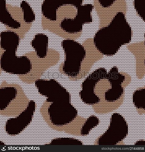 Leopard seamless pattern in knitted style. Jacquard cheetah fur background. Abstract animal skin wallpaper. Design for fabric , textile print, surface, wrapping, cover. Vintage vector illustration. Leopard seamless pattern in knitted style. Jacquard cheetah fur background.