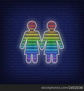 Lesbian couple neon sign. Rainbow colored girls shape, women, lgbt. Vector illustration in neon style for bright banners, light billboards, gay pride flyer