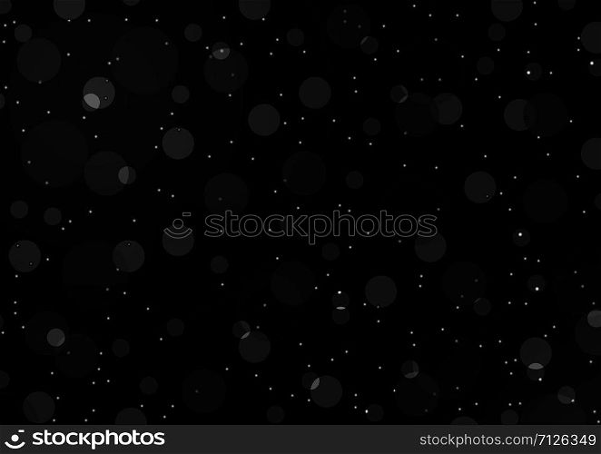 Light bokeh on a black background. Abstract black background.