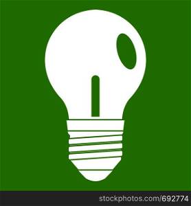 Light bulb icon white isolated on green background. Vector illustration. Light bulb icon green