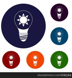 Light bulb with sun inside icons set in flat circle red, blue and green color for web. Light bulb with sun inside icons set