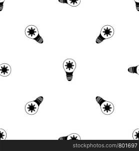 Light bulb with sun inside pattern repeat seamless in black color for any design. Vector geometric illustration. Light bulb with sun inside pattern seamless black