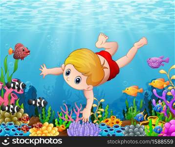 Little boy swimming under the sea