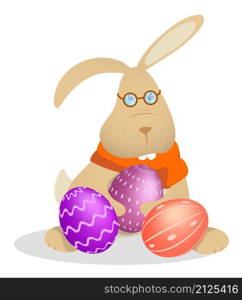 Little funny rabbit in glasses and orange scarf sits with Easter eggs in paws. Symbol of Easter holiday. Childrens vector illustration