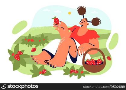 Little girl eats strawberries sitting on lawn with growing berries during summer harvest. Happy female teenager enjoying taste of organic strawberries working on farm or plantation. Little girl eats strawberries sitting on lawn with growing berries during summer harvest