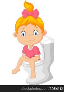 Little girl sitting on the toilet