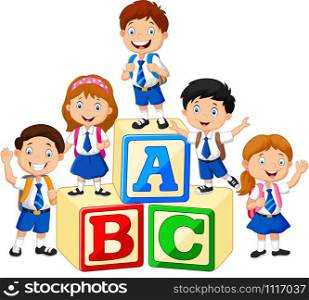 Little happy children with alphabet block