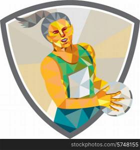 Low polygon style illustration of a netball player holding ball viewed from front set inside shield crest on isolated white background.. Netball Player Holding Ball Low Polygon