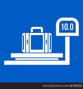 Luggage weighing icon white isolated on blue background vector illustration. Luggage weighing icon white