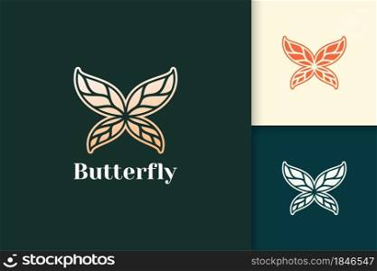 Luxury and abstract butterfly with gold leaf wing for beauty care or health
