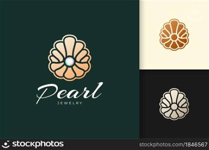 Luxury and high end pearl logo in abstract clam shape represent jewelry or gem